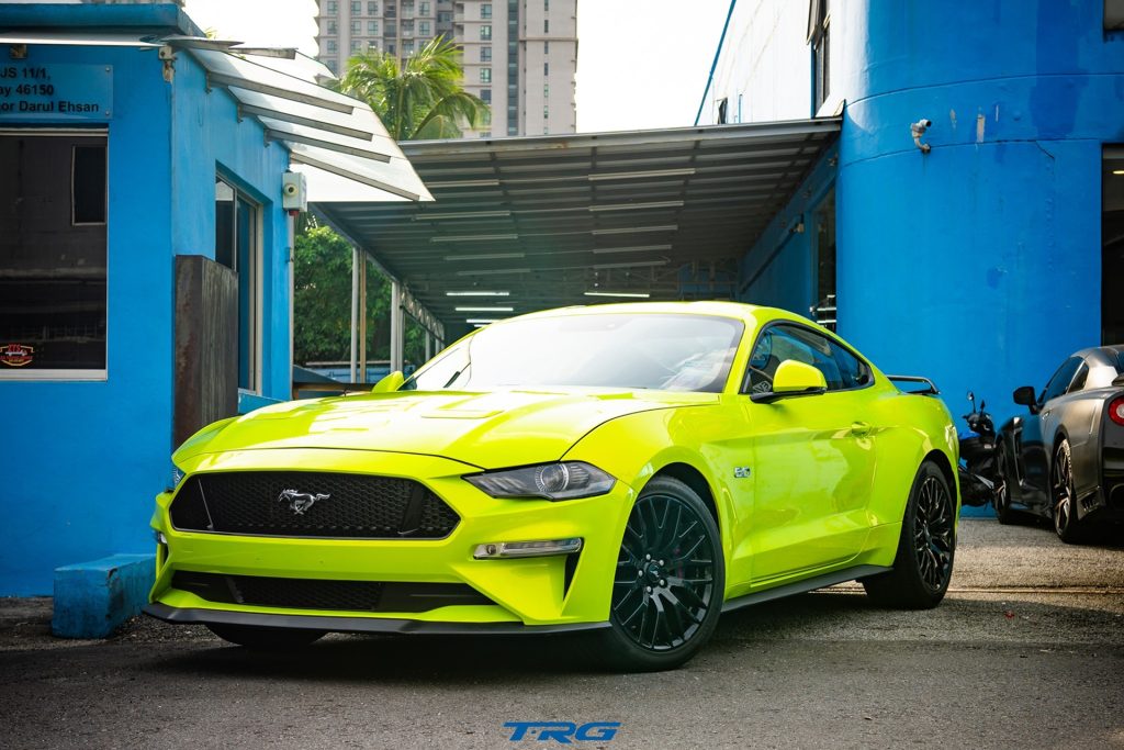 Green Ford Mustang GT S550 outside TopRacing Garage