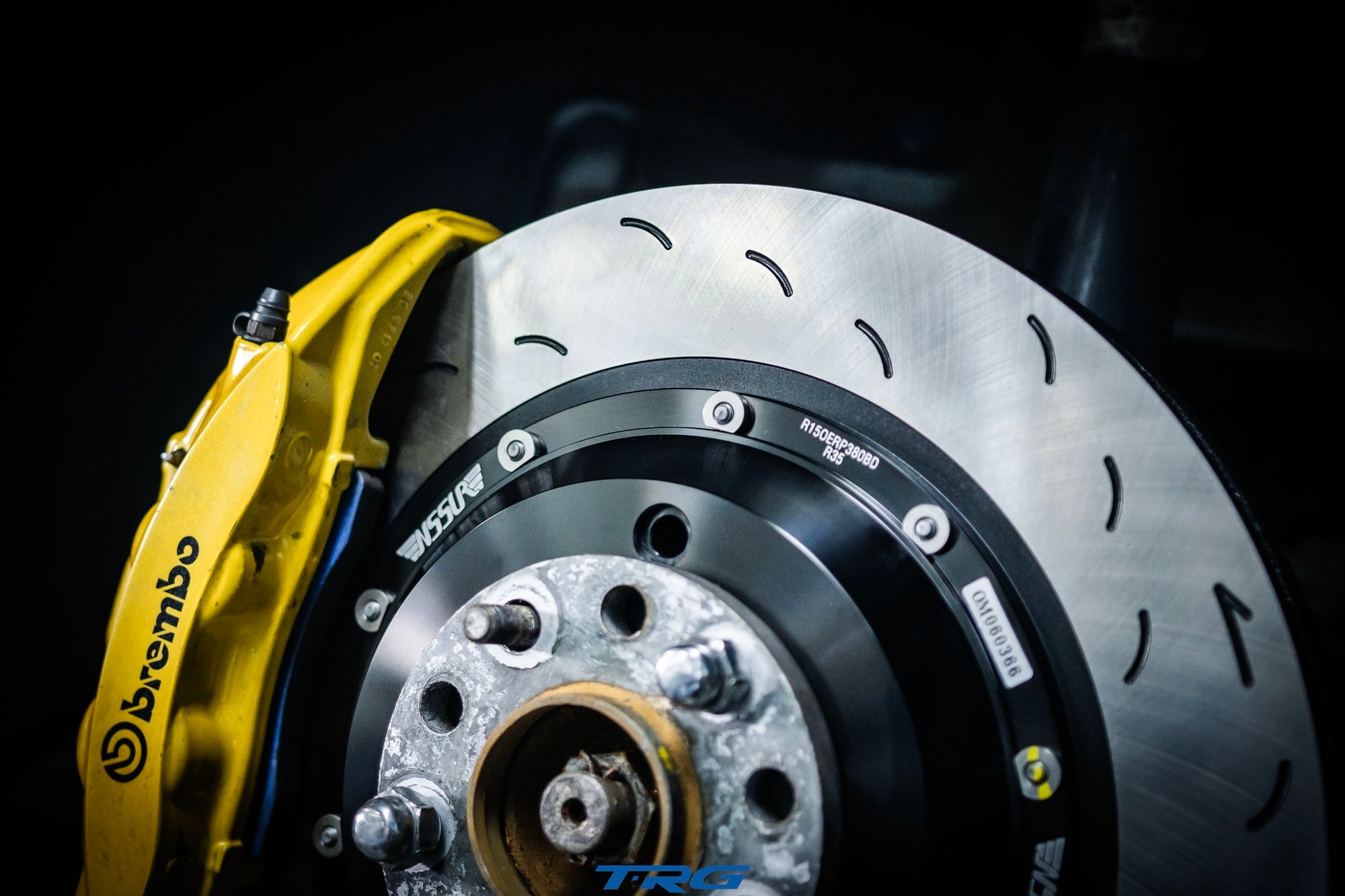 Neotech rear brake disc fitted behind the factory Brembo caliper on a Nissan GT-R R35