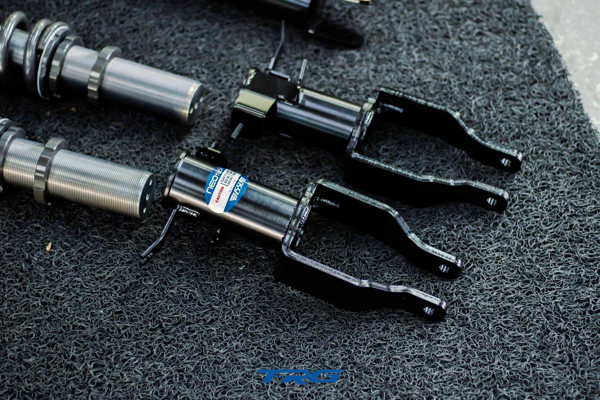 The two front Neotech units with welded fork brackets and Neotech caution stickers
